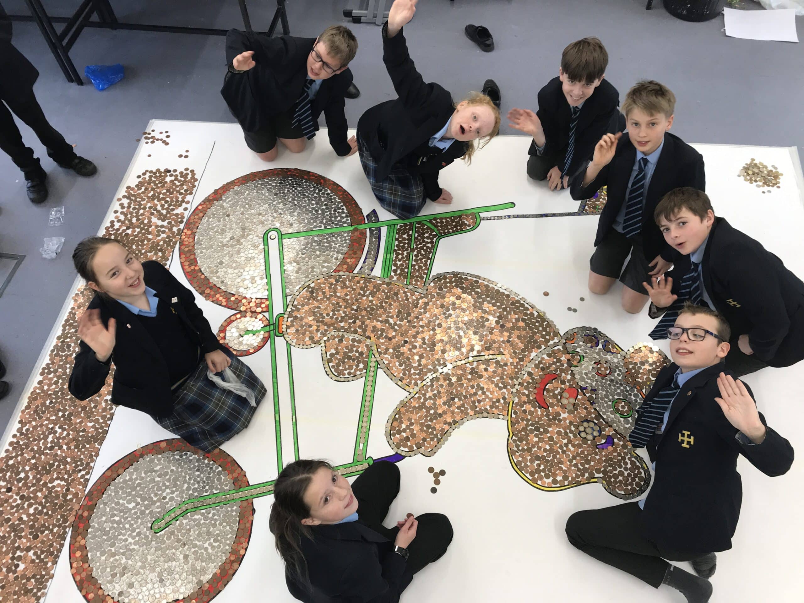 Coins collected to fill Pudsey Bear picture